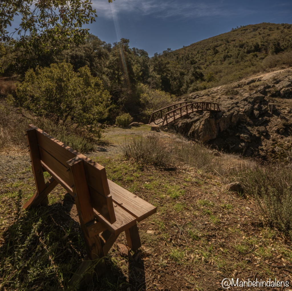 Bench At Eagle Peak Ranch A bench sits at Eagle Peak Ranch, looking out over the hills and valley.
