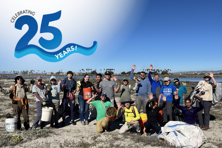25 year Anniversary logo with volunteer photo of people raising thier hands at the river mouth